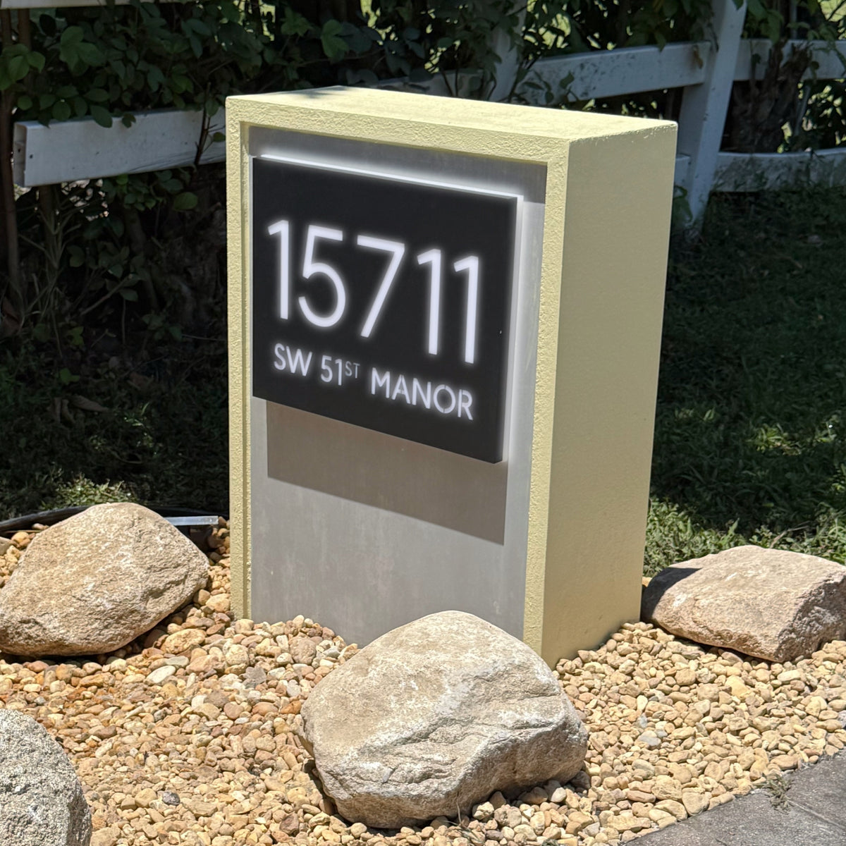 An illuminated LED address plaque with clean warm-lit numerals